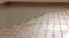 tempzone-floor-heating-cable-installed-over-wood-floor